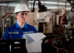 A technician carefully reviews a purchase order specifying calibration methods and parameters, ensuring alignment with internal protocols and standards.

