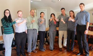 Mireaux Management Solutions Team Members sharing a toast