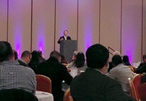 Mayor Annise Parker speaking in a conference