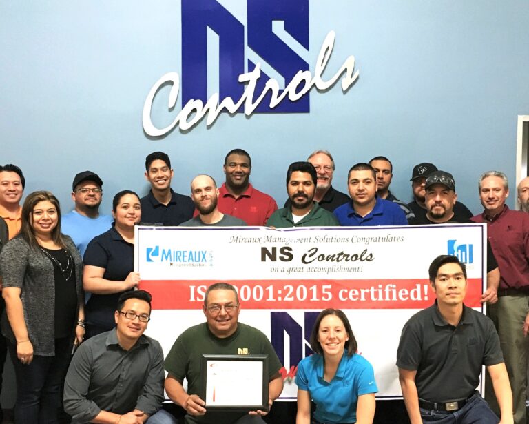 Team celebrating ISO Certification